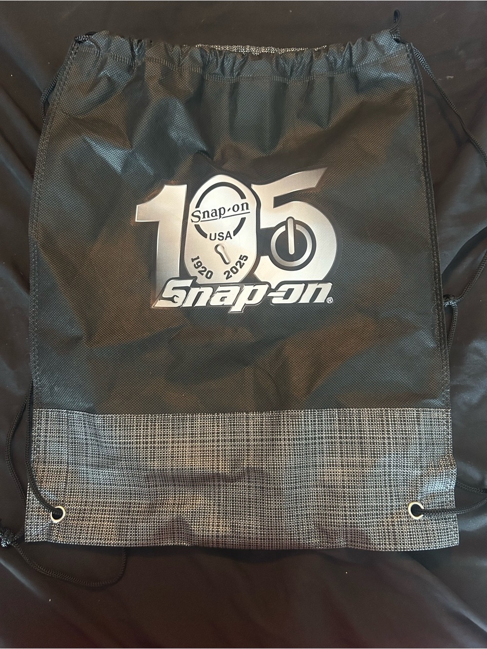 Snap-on Black Drawstring Backpack with Silver 105th Logo